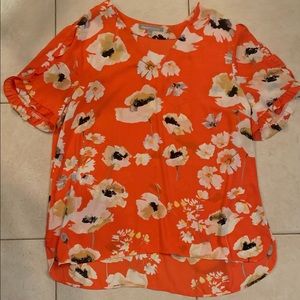 Orange floral blouse